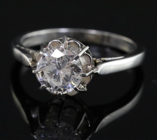 A platinum and solitaire diamond ring, size K.